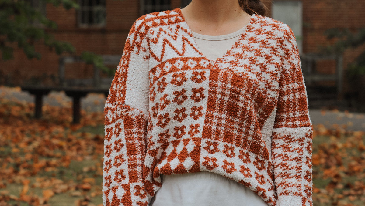 THE AUTUMN-RUST FLORAL CHECKER KNIT SWEATER