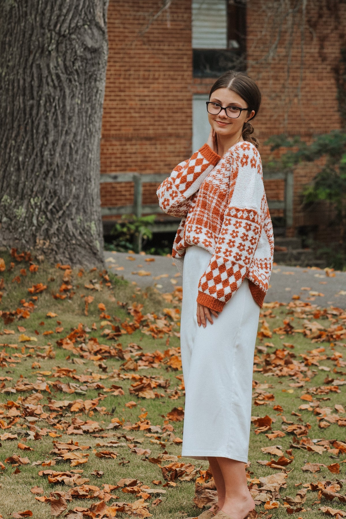 THE AUTUMN-RUST FLORAL CHECKER KNIT SWEATER